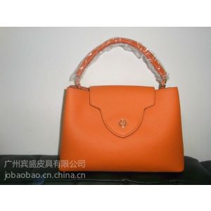 供應(yīng)廣州女士手抓包定做|女士晚裝包批發(fā)|西裝夾報價|的牛皮包生產(chǎn)商