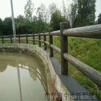 中达建材厂出售水泥仿木树皮桩 草坪护栏围栏