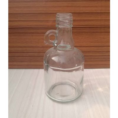 徐州天洪益华出口玻璃瓶厂来样加工高白料250ml玻璃圆茶油瓶配盖子