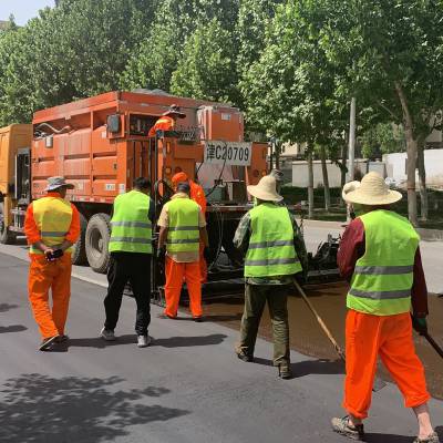 潢川超薄磨耗层道路养护施工的价格。