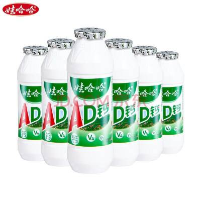 娃哈哈AD钙奶瓶贴标机-全自动旋转式热熔胶圆瓶贴标机
