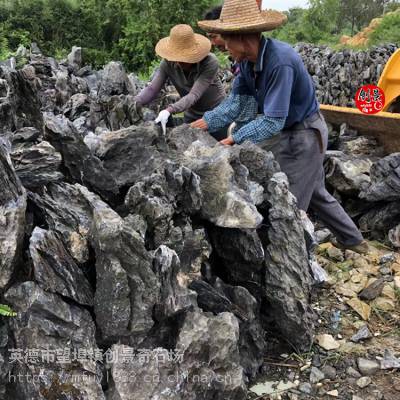 发往贵州英石峰石过程-英石峰石假山石批发-叠石英德石峰石案例