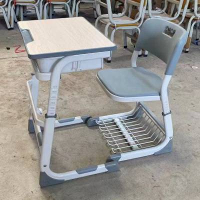 中小学生学生螺丝升降单人位课桌椅 桌椅高度可调节 可升降课桌厂家