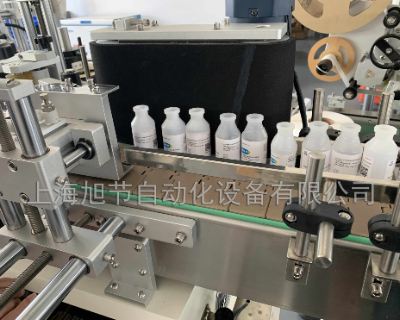 吉林奶瓶全自动圆瓶贴标机支持定制 客户至上 上海旭节自动化设备供应