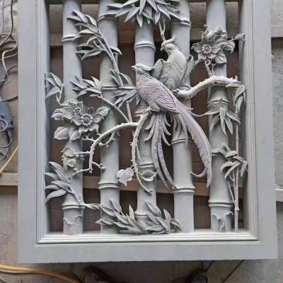 墙壁石雕影壁墙晚霞红竹子四季发财云纹浮雕