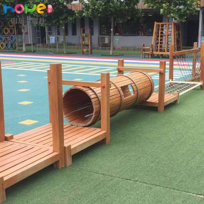 幼儿园户外玩具山东厚朴幼儿园实木钻桶组合户外感统组合