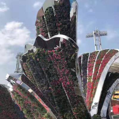 贵州铜仁2022欢度春节雕塑适合展览馆建筑物入口处仿真绿雕孔雀