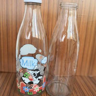 徐州出口玻璃瓶厂家长期供应250m高白料l印花玻璃酸奶瓶配专用盖子