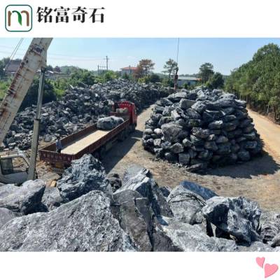 造型多样的圆形石，黑山石景观设计石，烟台自然原石图片
