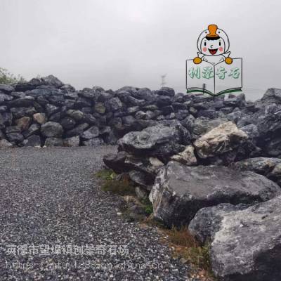 200吨黑山石发货深圳-草坪点缀驳岸石-园林常用景观假山石材