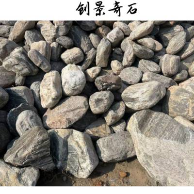 院子泰山石案例-深圳分享泰山石用途-泰山石饱含韵律纹理