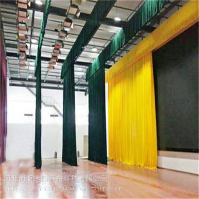 学校会场投影幕布 _郑州电动升降舞台幕布_防火舞台幕布出厂价