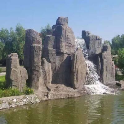 大庆景区水泥钢架假山瀑布 鱼池环绕 坚固耐用 满意验收